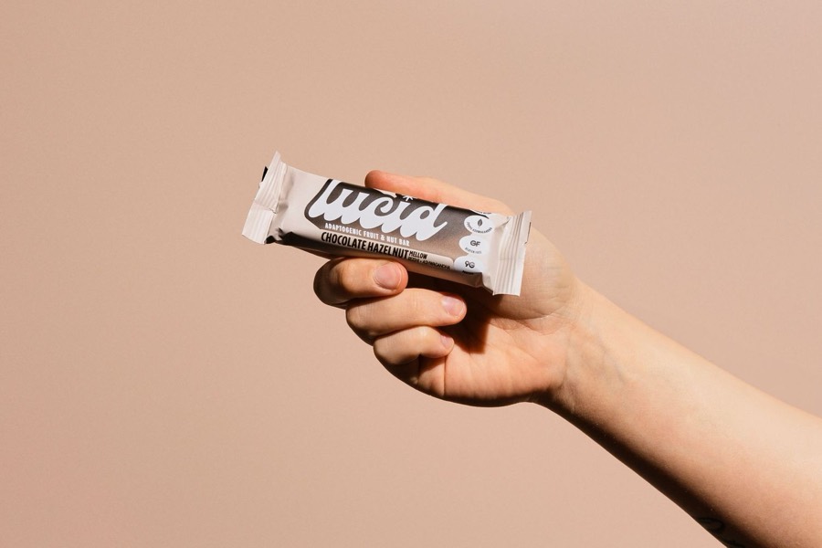 Lucid product held in hand